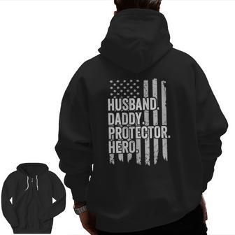 Husband Daddy Protector Hero Dad Hero American Flag Zip Up Hoodie Back Print | Mazezy