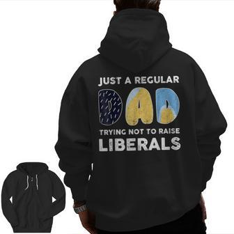 Just A Regular Dad Trying Not To Raise Liberals Fathers Day Zip Up Hoodie Back Print | Mazezy