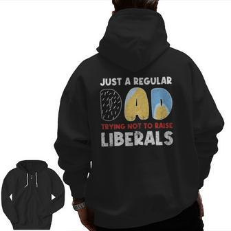 Just A Regular Dad Trying Not To Raise Liberals Zip Up Hoodie Back Print | Mazezy