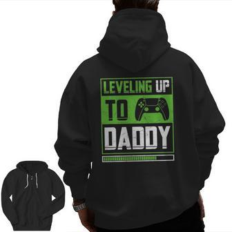 Leveling Up To Daddy Vintage Gamer Pregnancy Announcement Zip Up Hoodie Back Print | Mazezy
