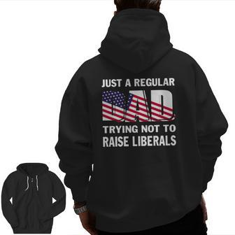 Mens Just A Regular Dad Trying Not To Raise Liberals Fathers Zip Up Hoodie Back Print | Mazezy