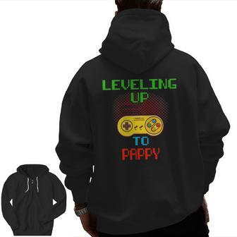 Promoted To Pappy Unlocked Gamer Leveling Up Zip Up Hoodie Back Print | Mazezy