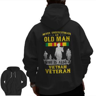 Never Underestimate An Old Man Vietnam Veteran Veteran Zip Up Hoodie Back Print | Mazezy