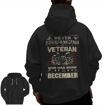 Never Underestimate A Veteran Who Was Born In December Zip Up Hoodie Back Print | Mazezy AU