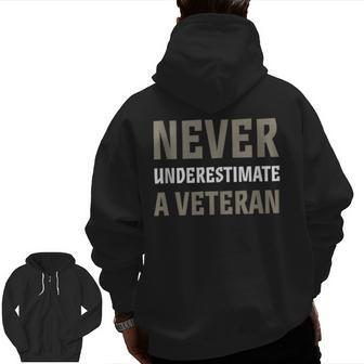 Never Underestimate A Veteran Veterans Day Warrior Usa Veteran Zip Up Hoodie Back Print | Mazezy