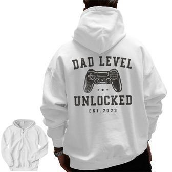 Mens Dad Level Unlocked 2023 New Dad To Be Gamer Father Day Zip Up Hoodie Back Print | Mazezy