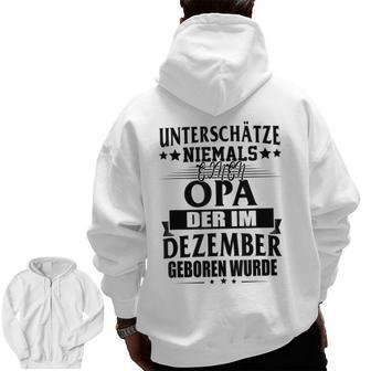 Never Underestimate Grandpa Who Was Born In December Zip Up Hoodie Back Print | Mazezy