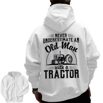 Never Underestimate An Old Man With A Tractor Farmer Dad Zip Up Hoodie Back Print | Mazezy