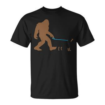 Bigfoot Walking Rottweiler Dog Sasquatch T-Shirt | Mazezy