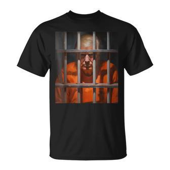 Donald Trump Behind Bars Hot Orange Jumpsuit Humor T-Shirt - Monsterry