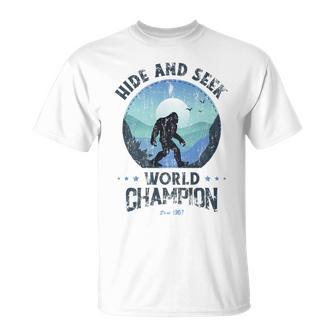 Bigfoot Hide And Seek Bigfoot Hide And Seek Champion T-Shirt - Monsterry UK