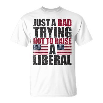 Just A Dad Trying Not To Raise A Liberal T-Shirt - Seseable