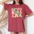 Groovy In My Nina Era Nina Retro Women's Oversized Comfort T-shirt Crimson