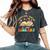 Adventure Begins At Your Library Summer Reading 2024 Groovy Women's Oversized Comfort T-Shirt Pepper