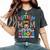 Autism Mom Raising Hero Groovy Messy Bun Autism Awareness Women's Oversized Comfort T-Shirt Pepper