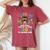 Autism Mom Raising Hero Groovy Messy Bun Autism Awareness Women's Oversized Comfort T-Shirt Crimson