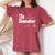 The Godmother Of New Baby Girl Pun Women's Oversized Comfort T-Shirt Crimson