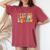 Retro Groovy Testing Squad Test Day Motivational Teacher Kid Women's Oversized Comfort T-Shirt Crimson