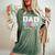 Dad 2024 Loading A Girl Or A Boy Baby Pregnancy Announcement Women's Oversized Comfort T-Shirt Moss