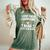 Pop The Champagne Nana Is My New Name Women's Oversized Comfort T-Shirt Moss