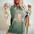 Retro Groovy Cna Squad Bunny Ear Flower Easter Women's Oversized Comfort T-Shirt Moss