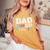 Dad 2024 Loading A Girl Or A Boy Baby Pregnancy Announcement Women's Oversized Comfort T-Shirt Mustard