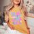 Groovy Tie Dye In My Lacrosse Girl Era Women's Oversized Comfort T-Shirt Mustard