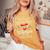 Knitting Never Underestimate Old Woman With Knit Needles Women's Oversized Comfort T-Shirt Mustard Knitting Never Underestimate Old Woman With Knit Needles Women's Oversized Comfort T-Shirt Mustard