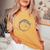 Solar Eclipse Moon And Sun Cool Event Graphic Women's Oversized Comfort T-Shirt Mustard