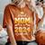 Proud Mom Of A Class Of 2024 Graduate Mom Senior 2024 Women's Oversized Comfort T-Shirt Yam