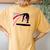 Girls Gymnastics Balance Beam Swirl Women's Oversized Comfort T-Shirt Back Print Mustard