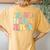 Groovy In My Nina Era Nina Retro Women's Oversized Comfort T-Shirt Back Print Mustard