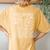 Typography 1St Grade Team Student Teacher Women's Oversized Comfort T-Shirt Back Print Mustard