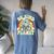 Groovy Earth Day Be Kind To Our Planet Retro Environmental Women's Oversized Comfort T-Shirt Back Print Moss