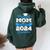 Super Proud Mom Of 2024 Graduate Awesome Family College Women Oversized Hoodie Back Print Forest