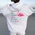 Flamingo Wrinkles Only Go Where Smiles Have Been Women Oversized Hoodie Back Print White