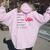 Flamingo Wrinkles Only Go Where Smiles Have Been Women Oversized Hoodie Back Print Light Pink
