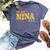 In My Nina Era Groovy Tie Dye Bella Canvas T-shirt Heather Navy