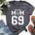 Custom Proud Football Mom Number 69 Personalized For Women Bella Canvas T-shirt Heather Dark Grey