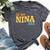 In My Nina Era Groovy Tie Dye Bella Canvas T-shirt Heather Dark Grey