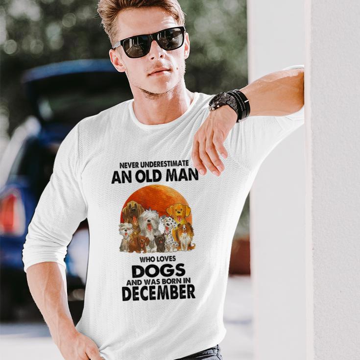 Never Underestimate An Old Man Who Loves Dogs Born December Long Sleeve T-Shirt Gifts for Him