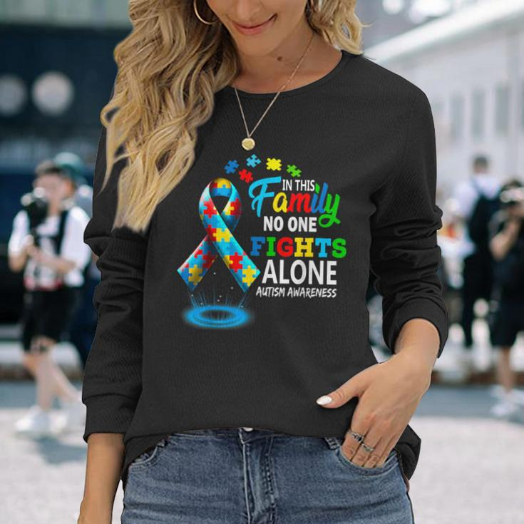 In This Family Nobody Fights Alone Blue Autism Awareness Long Sleeve T-Shirt Gifts for Her