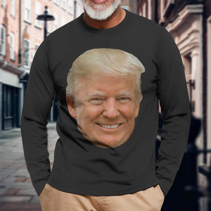 Donald J Trump Das Gesicht Des Präsidenten Auf Einem Meme Langarmshirts Geschenke für alte Männer