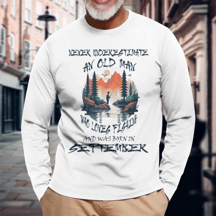 Never Underestimate Old Man Loves Fishing Born In September Long Sleeve T-Shirt Gifts for Old Men