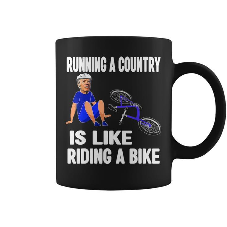 Biden Falls Off Bike Joe Biden Falling Off His Bicycle Coffee Mug