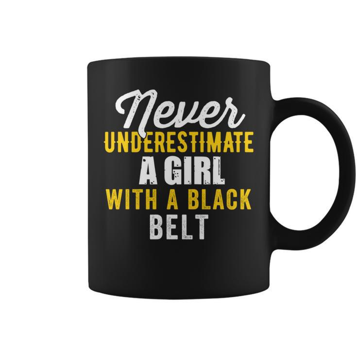 Never Underestimate A Girl With A Black Belt Coffee Mug