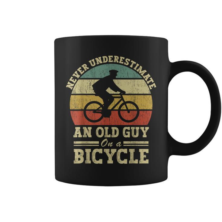 Never Underestimate An Old Guy On A Bicycle Cycling Coffee Mug