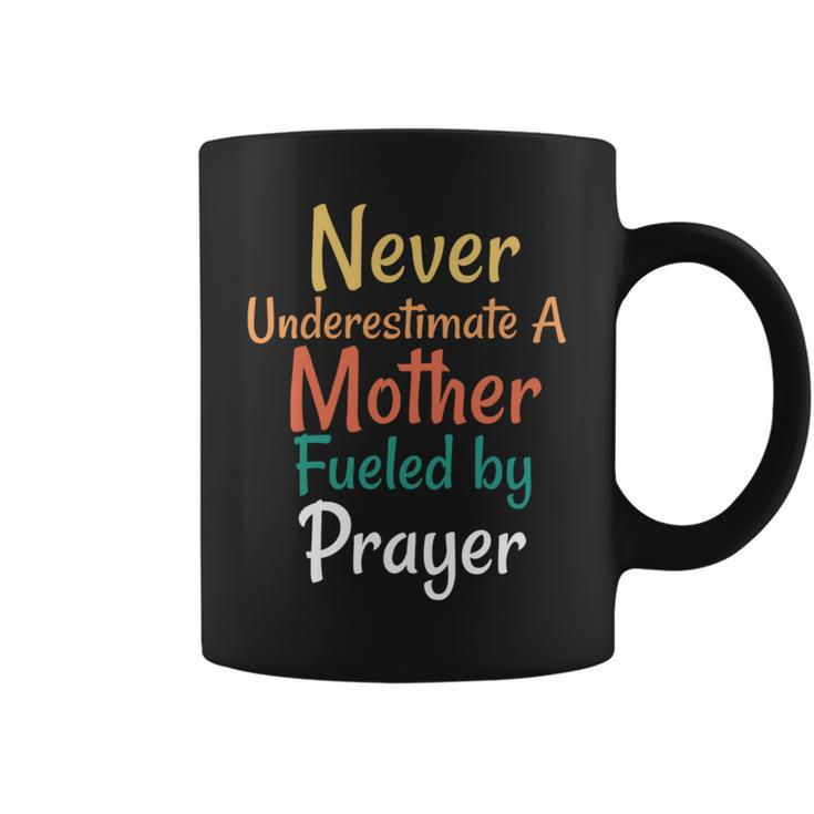 Never Underestimate A Mother Fueled By Prayer Praying Mama Coffee Mug