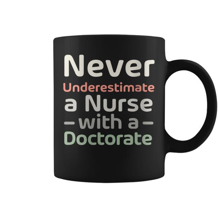 Never Underestimate A Nurse With A Doctorate Coffee Mug
