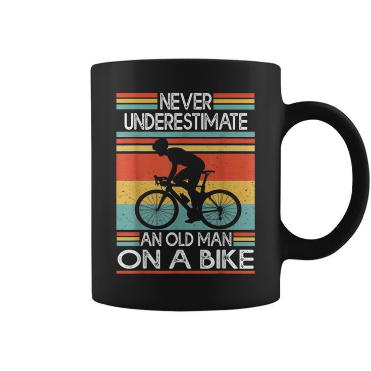 Never Underestimate An Old Man On A Bike Cycling Coffee Mug